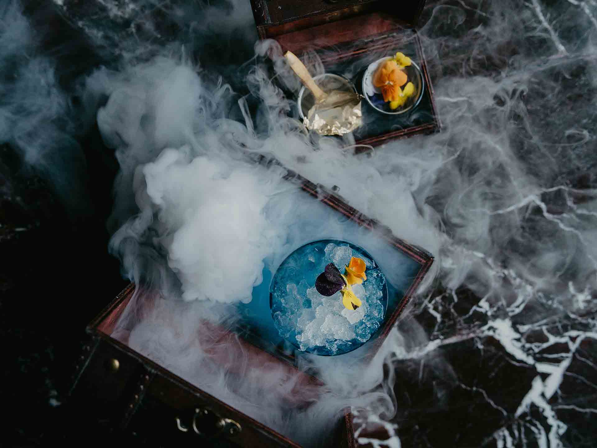 Cocktails served with dry ice at Lulu Wild cocktail bar, Birmingham